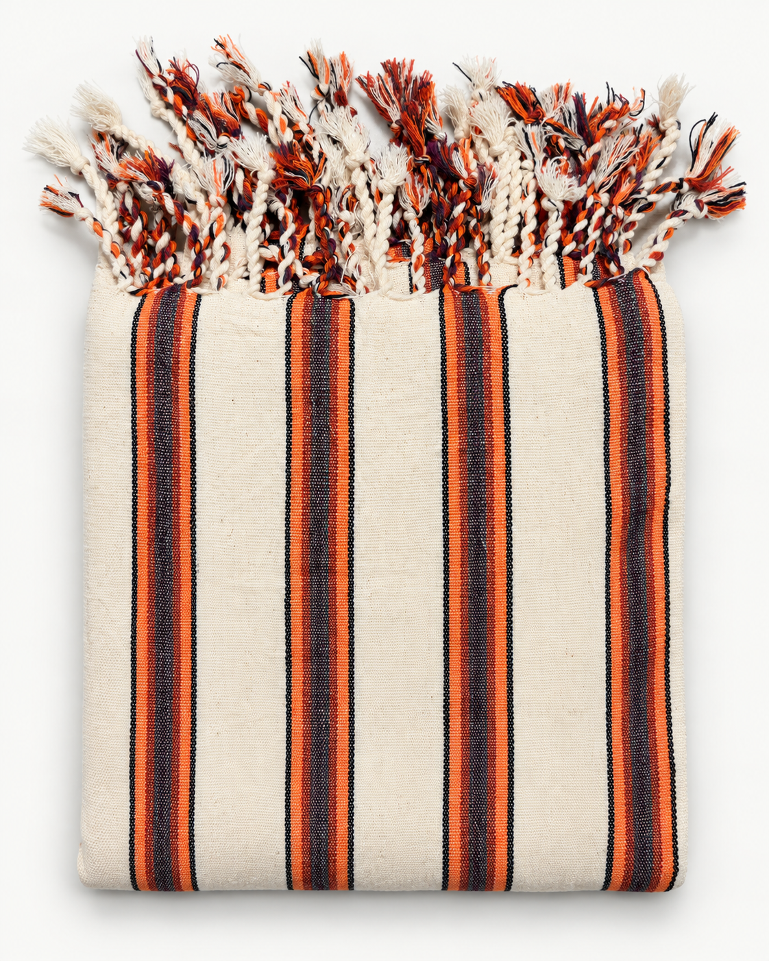Sunset Ember handloom Turkish beach towel featuring burnt-orange and charcoal-black woven stripes on natural ivory fabric with individually hand-braided fringes.