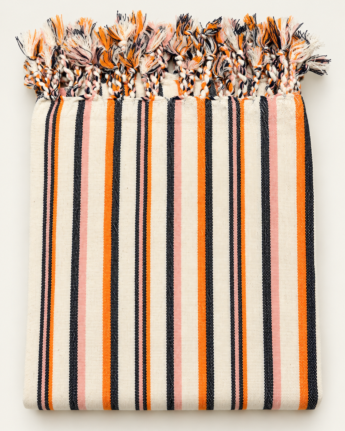 Coral Sunset handloom Turkish beach towel with coral-orange, blush pink and black woven stripes, ivory cotton and hand-braided fringes.
