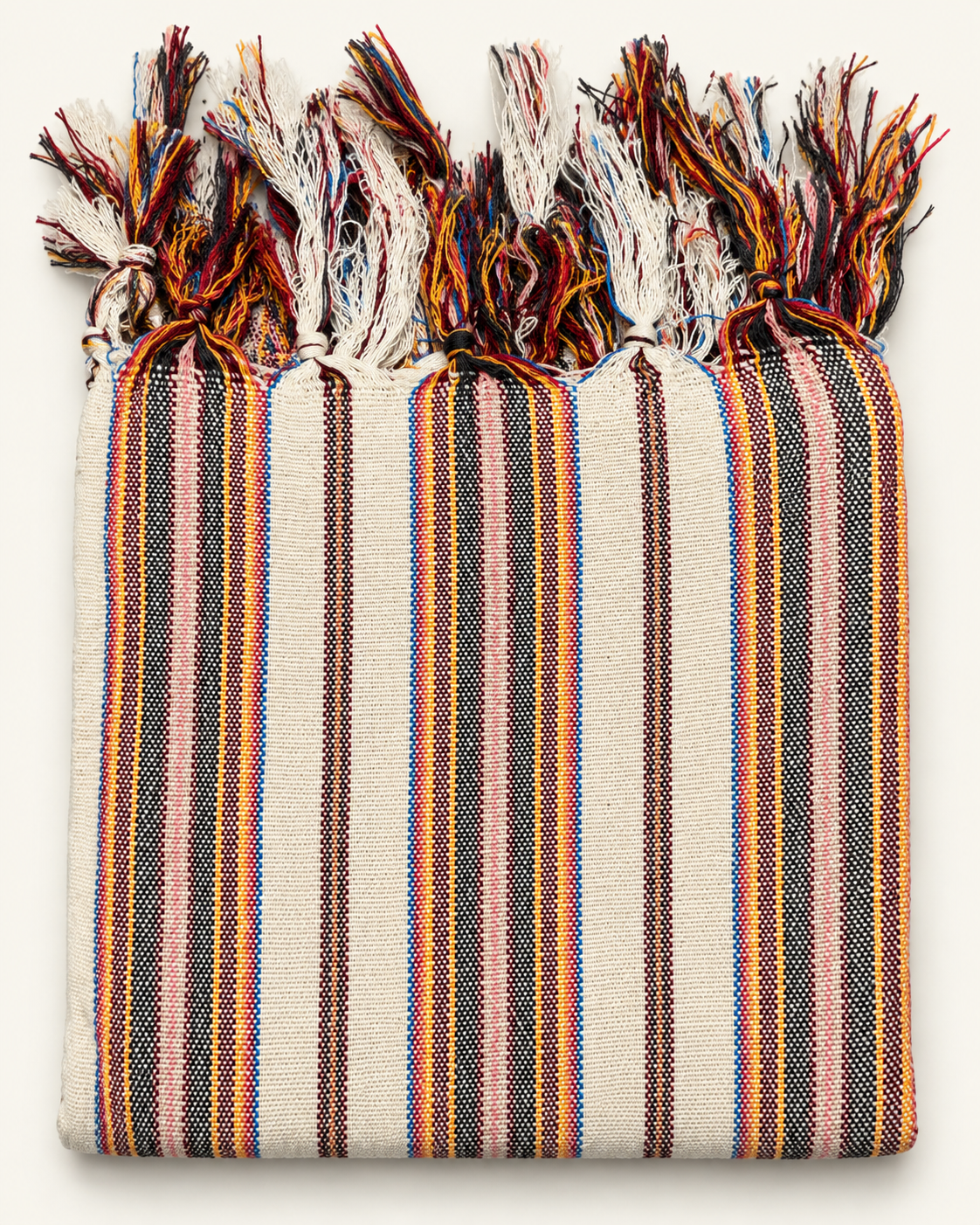 Anatolian Ember handloom Turkish towel with burgundy, black, orange, yellow and blue woven stripes on ivory fabric and individually hand-braided fringes.