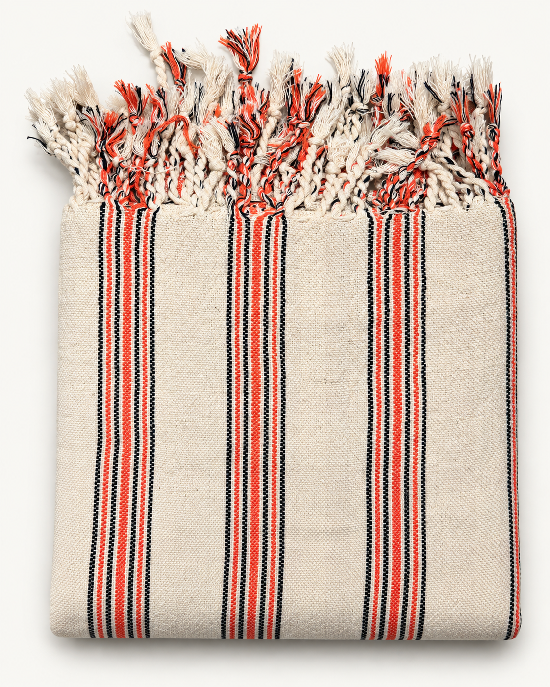 Coral Riviera handloom Turkish beach towel with coral red and black woven stripes on natural ivory fabric, featuring individually hand-braided fringes.